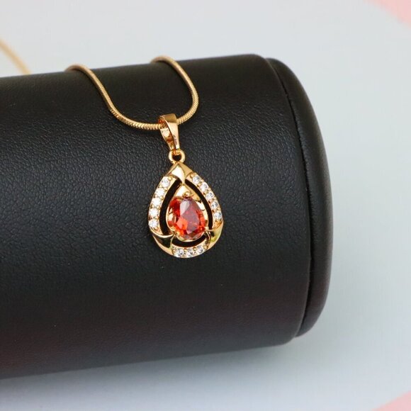 "Red Pear-Shaped Pendant with Gold Finish and Dazzling Accents, XPPT1802 - Picture 4 of 13